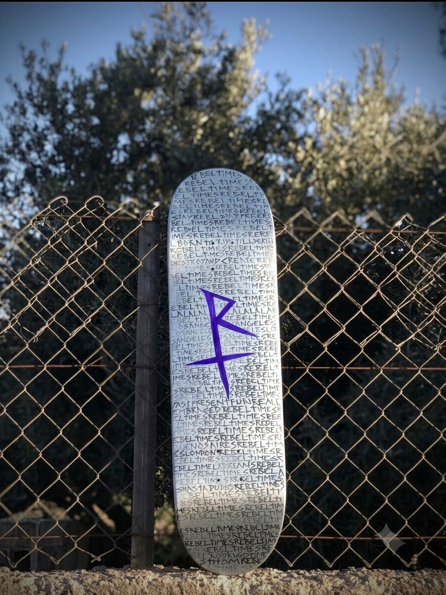 RebelTimes Skate Deck — Silver Rain of Scripts by Thom