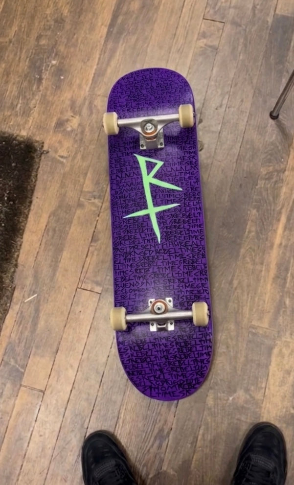 RebelTimes Skate Deck — Purple Rain of Scripts by Thom Rodrigo